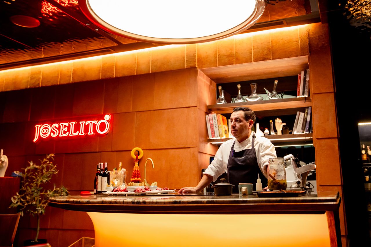 Chef Sandro Aguilera at the leather-clad pass in the dining room