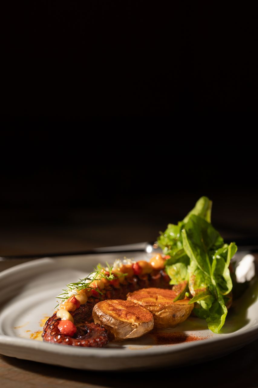 Grilled Galician octopus tentacle with paprika-dusted roast potatoes